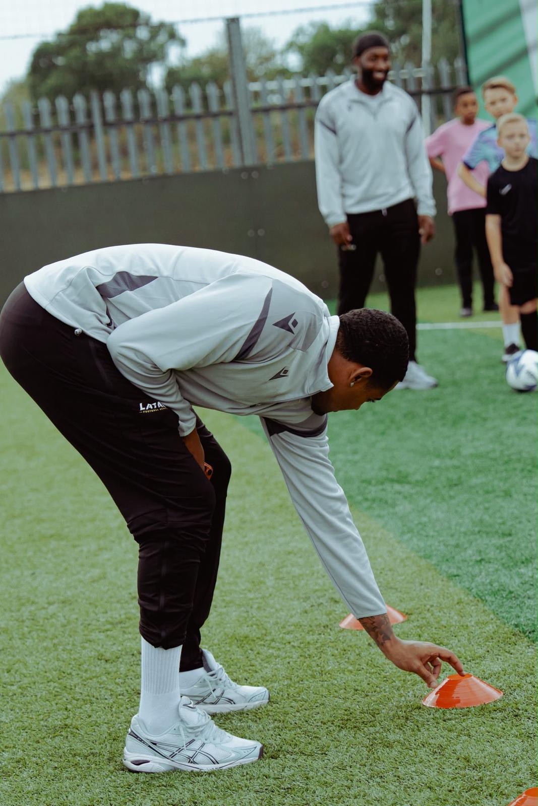 LATAA coach setting a training cone